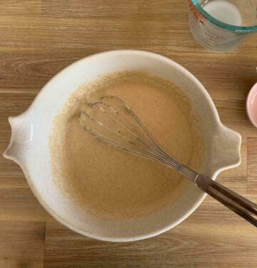 oat flour pancake batter in a white bowl