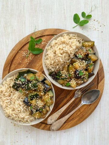 Two bowls of eggplant and rice dish