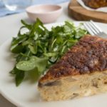 Piece of frittata with rocket salad