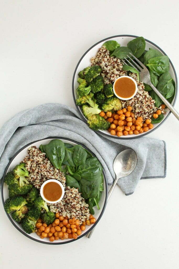 two buddha bowls with broccoli and chickpeas