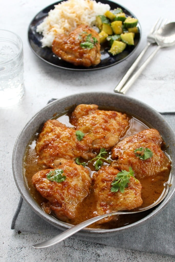 Sticky Chicken Recipe: Chicken thighs in a pan with sauce