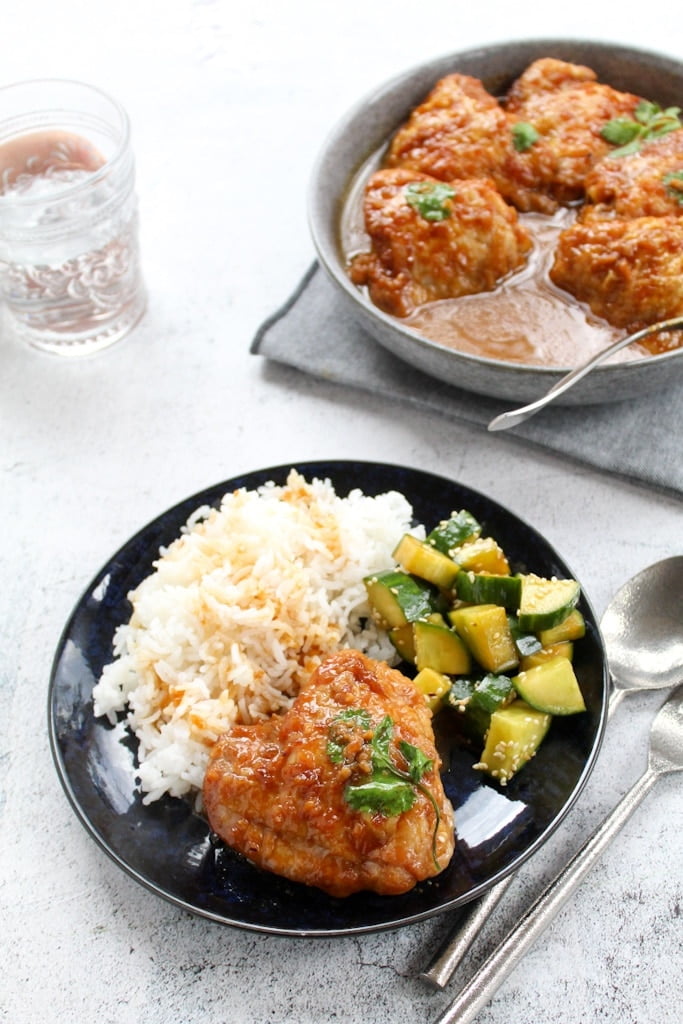 basmati rice served with sticky chicken and cucumber salad