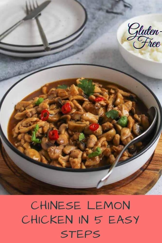 Chinese lemon chicken in a bowl with rice, coriander and chilly