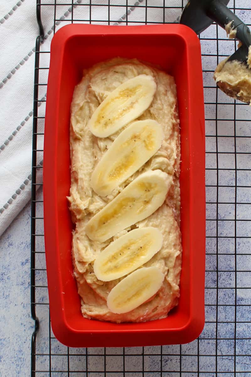 uncooked loaf of gluten-free banana bread in bread loaf pan
