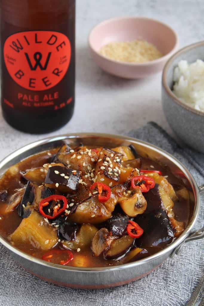 eggplant dish with rice and beer