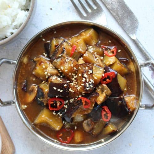 chinese eggplant in a bowl with rice and chilly