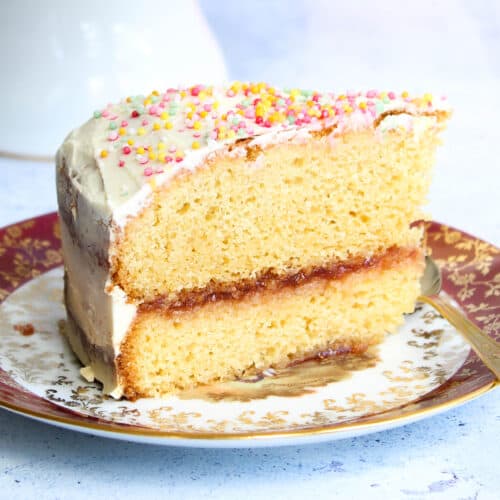 a slice of gluten-free sponge cake on a plate