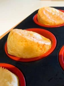 puffed cheese braed in a muffin tin