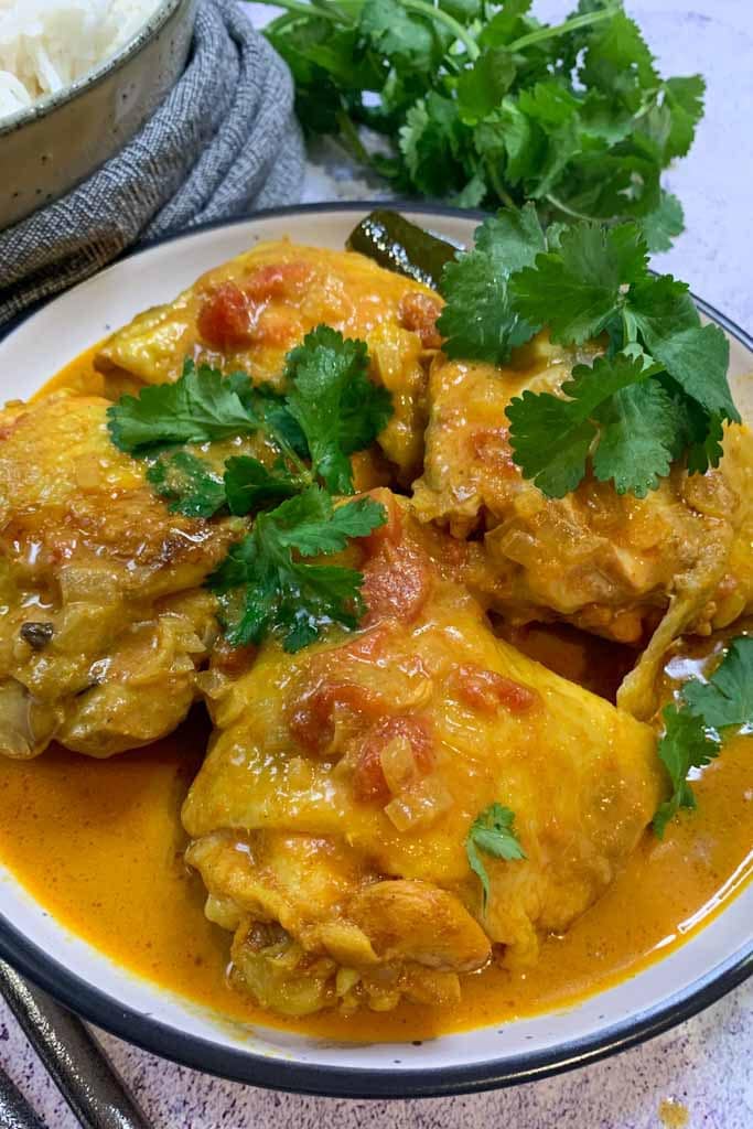 Madras curry chicken thighs on a plate
