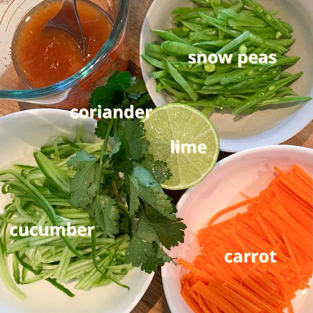 diced carrots, cucumber and snow peas in little plates