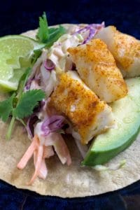 close up of fish tacos on a plate