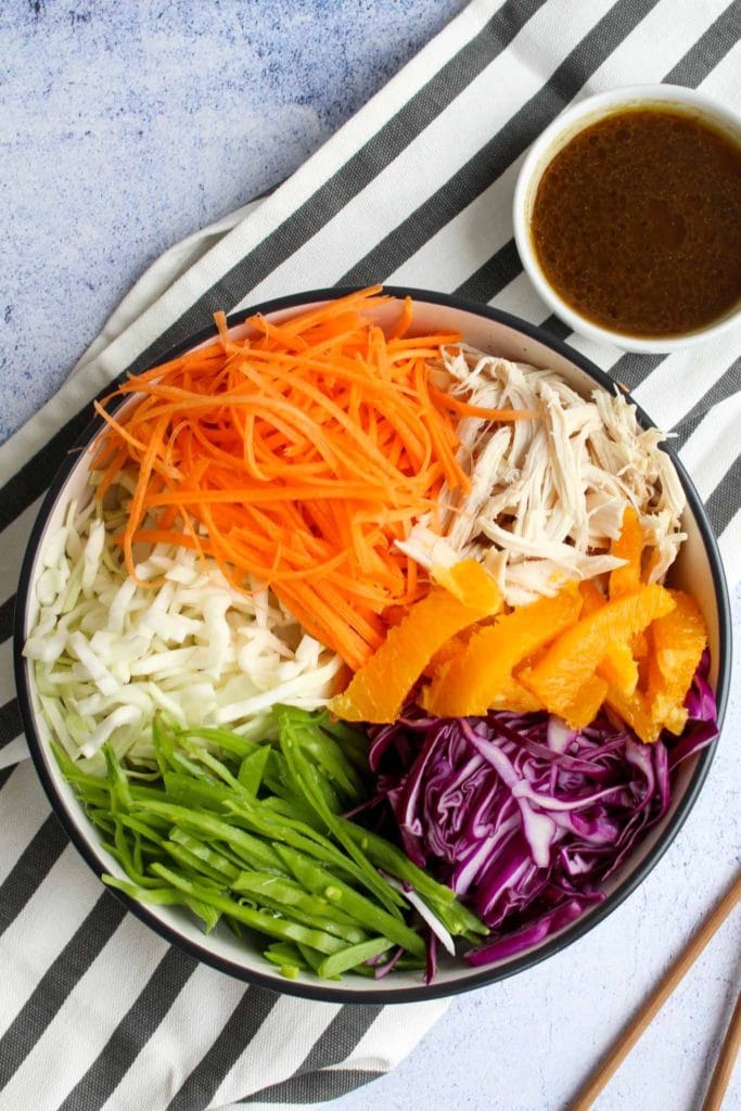 sliced vegetables and chicken for chinese chicken and orange salad