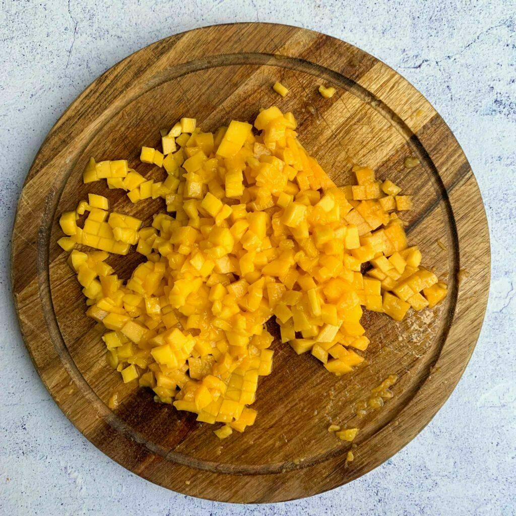 diced mango on a chopping board