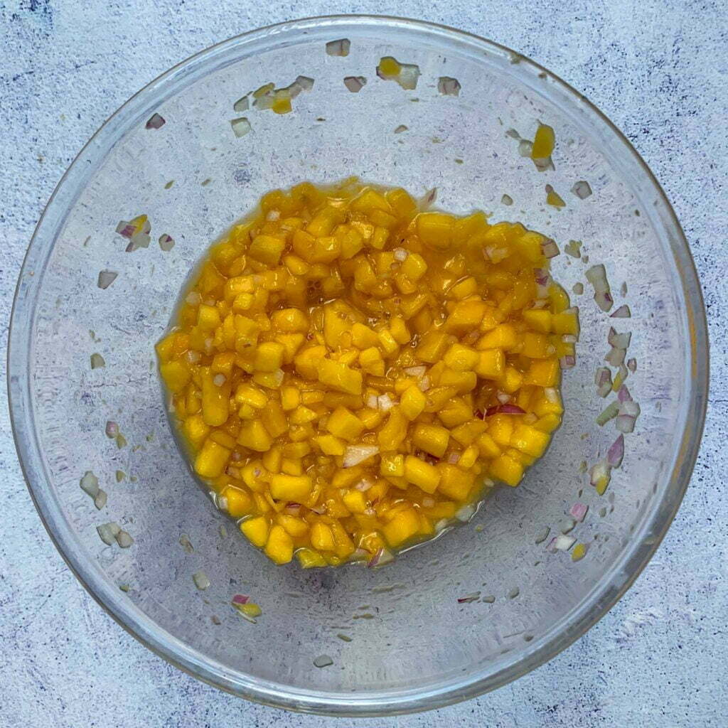 mango salsa in a glass bowl