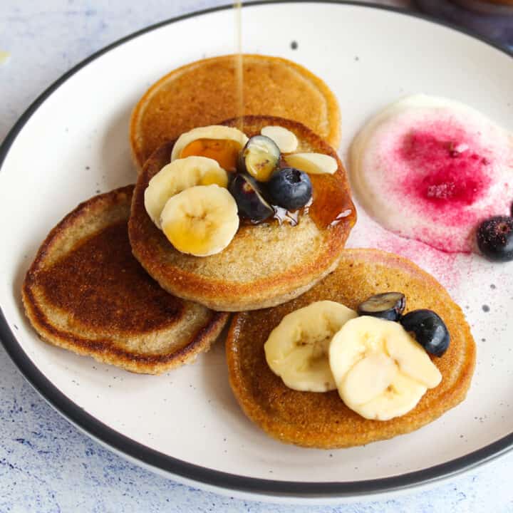 4 almond milk pancakes on a plate gluten-free