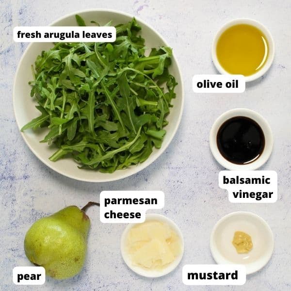 ingredients to make arugula salad with parmesan and pear