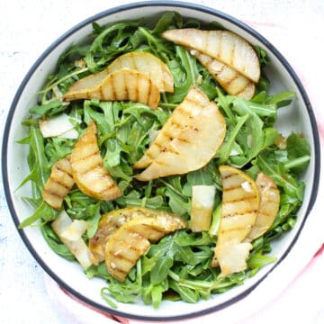 arugula salad with parmesan cheese and grilled pear