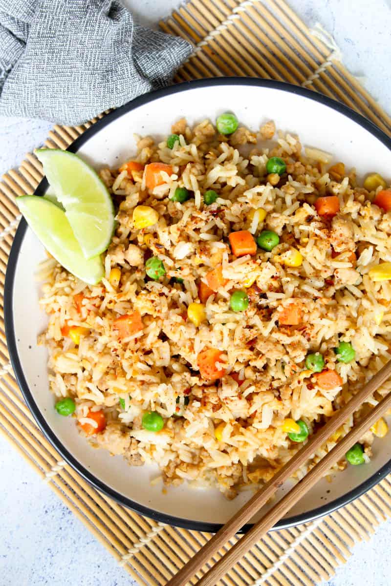 healthy fried rice on a plate with chop sticks