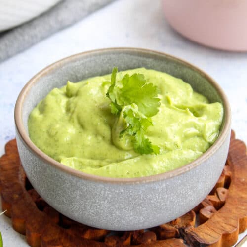 avocado lime dressing in a grey bowl