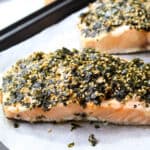 two baked furikake salmon filets on a tray