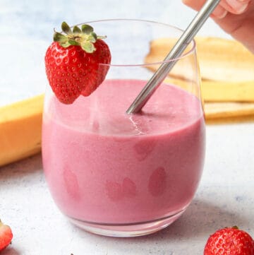 a strawberry and banana smoothie in a glass