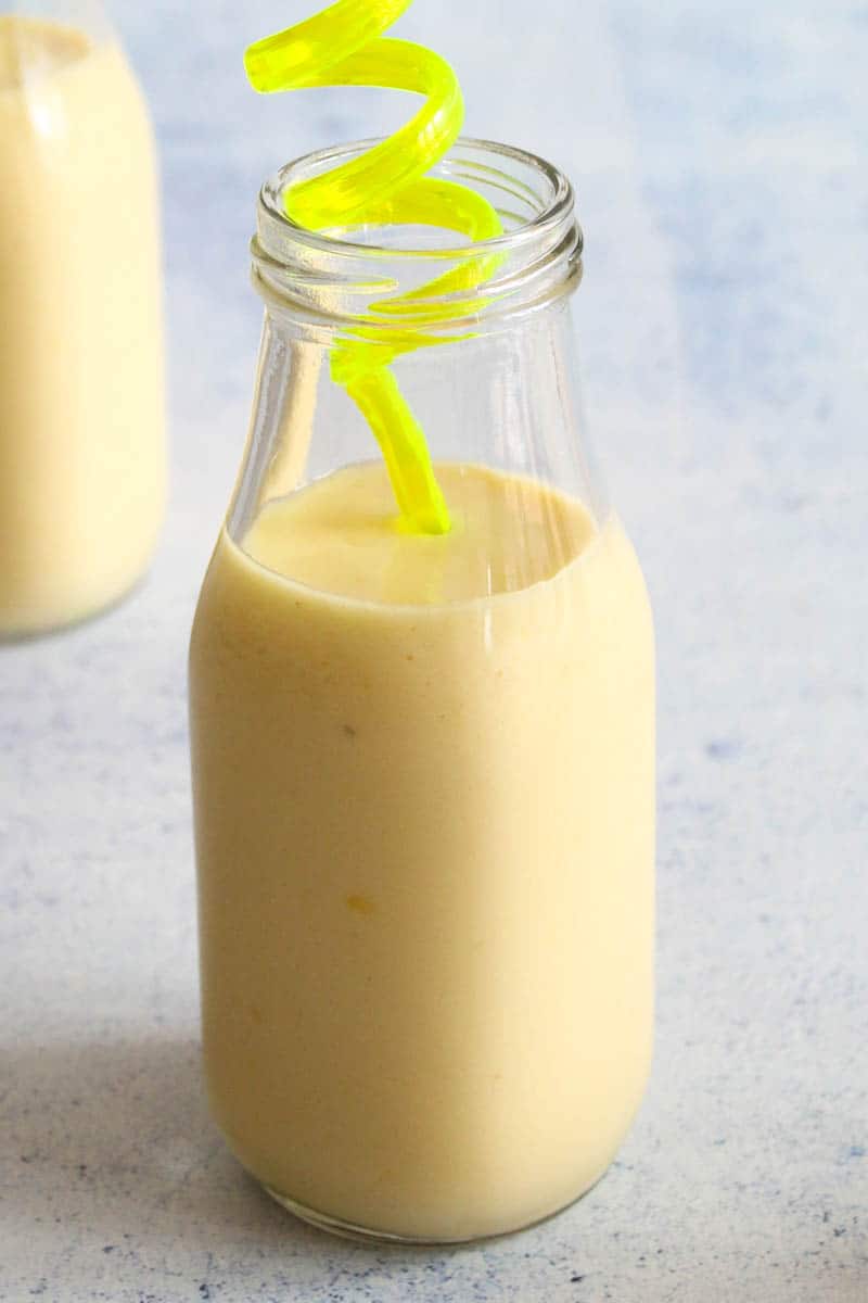 one bottle of mango and pineapple smoothie