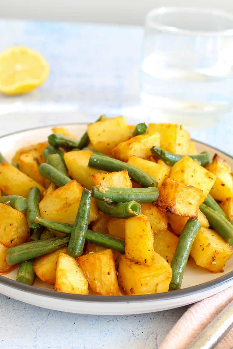 roasted green beans and potatoes served ready to be enjoyed