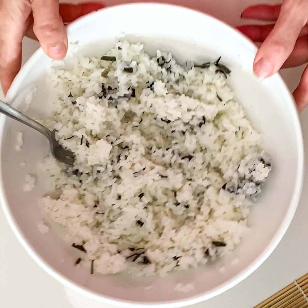 sushi rice mixed with shredded nori