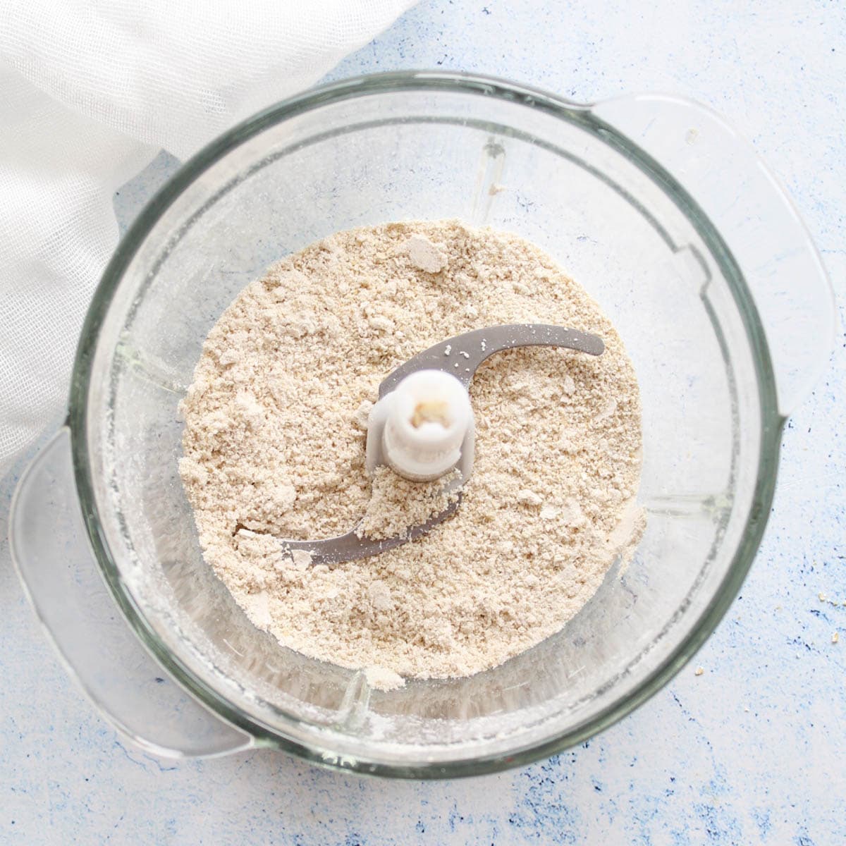 freshly made oat flour in a food processor bowl