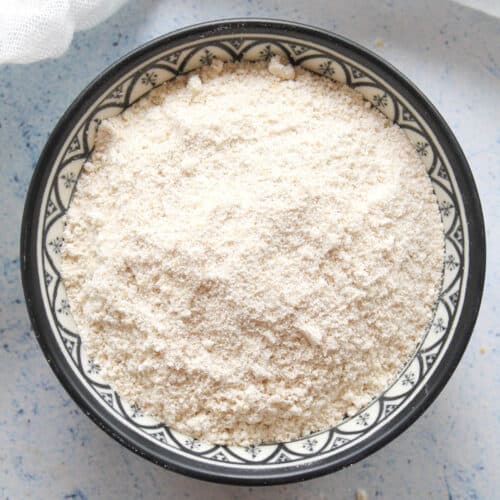 homemade oat flour in a black bolw