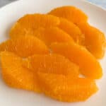 orange segments on a plate