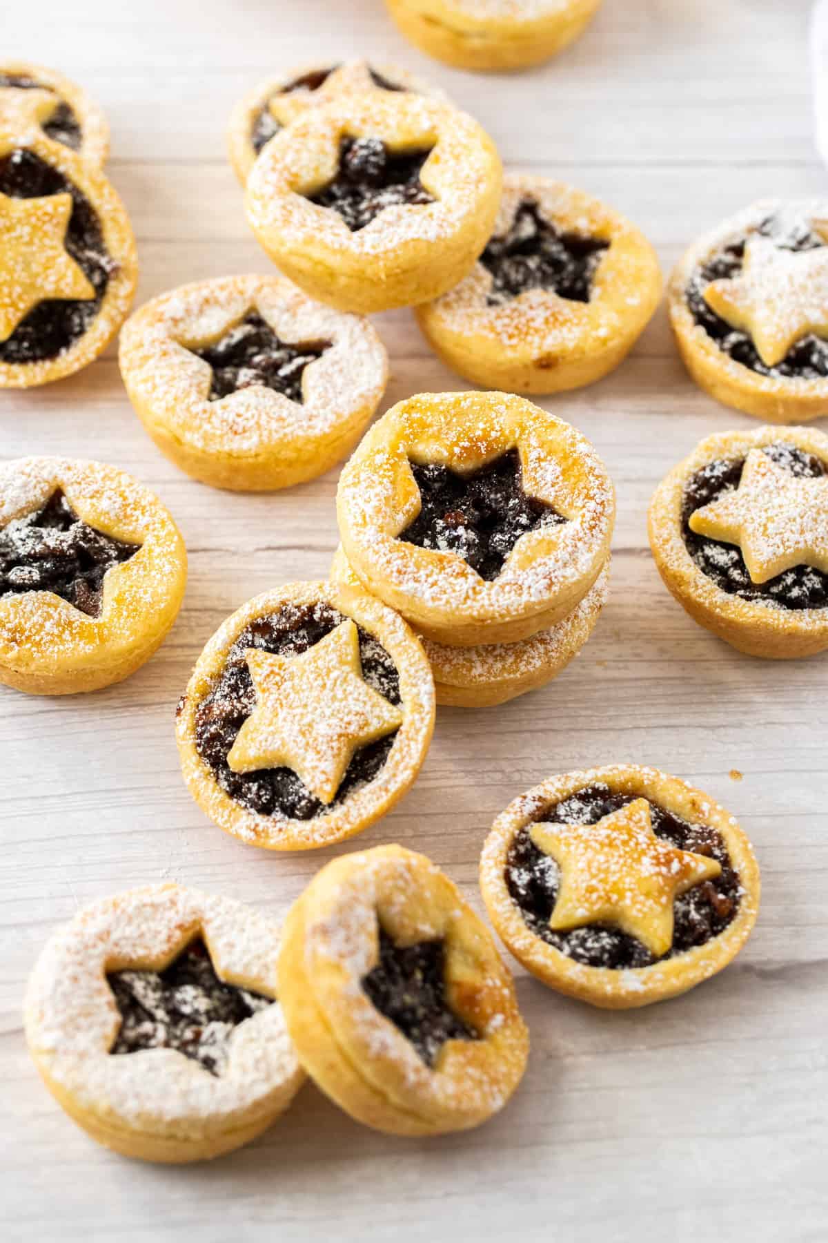 gluten-free mince pies scattered on a table