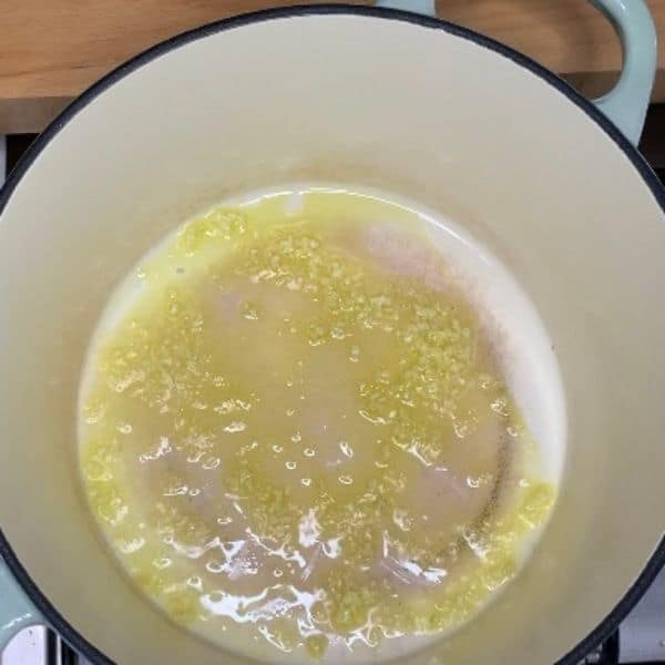 garlic in oil in a dutch oven