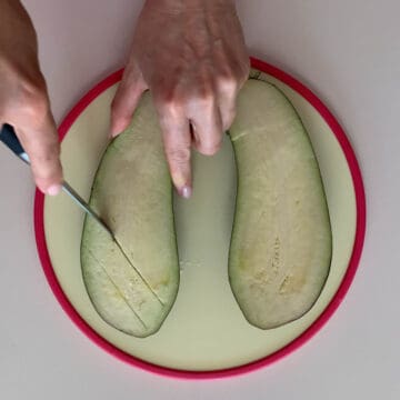 cutting eggplants in criss-cross pattern