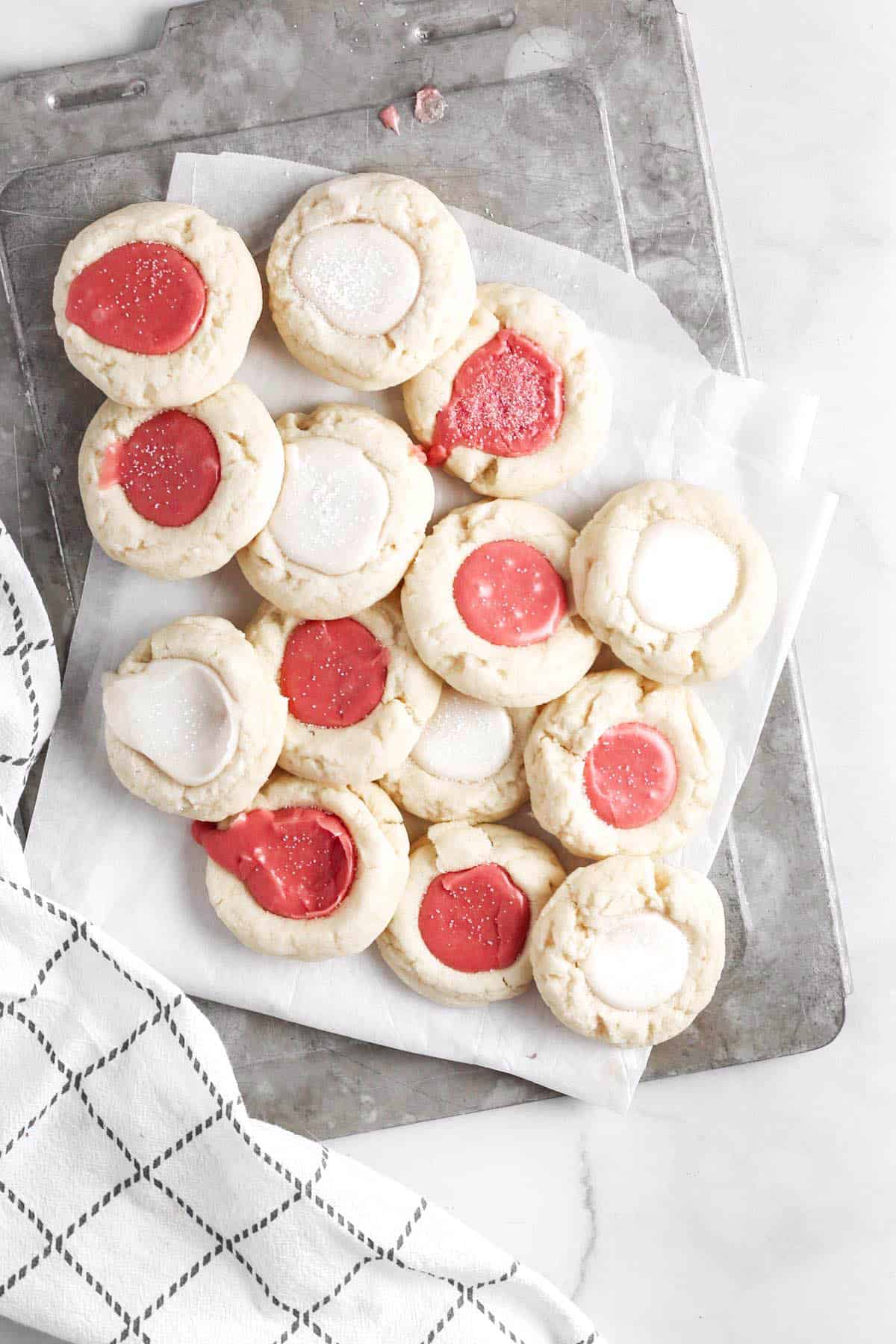 thumbprint cookies with white and red icing