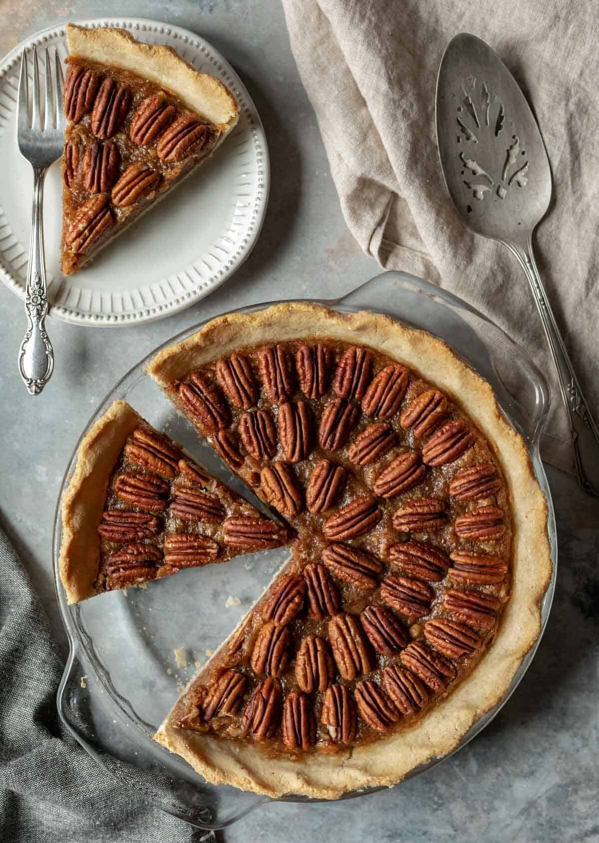 bourbon pecan pie, served on a plate