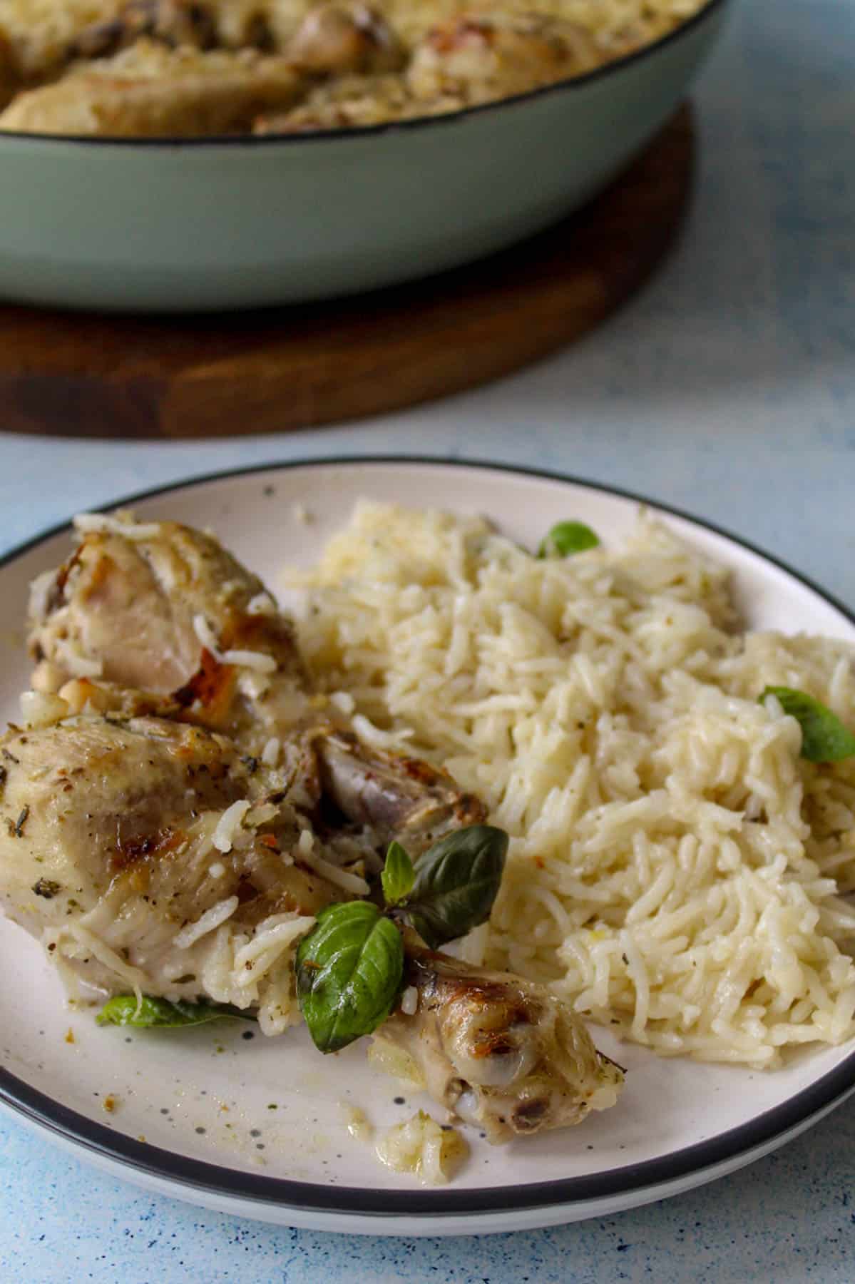 baked Greek lemon chicken drumsticks served with fluffy rice 