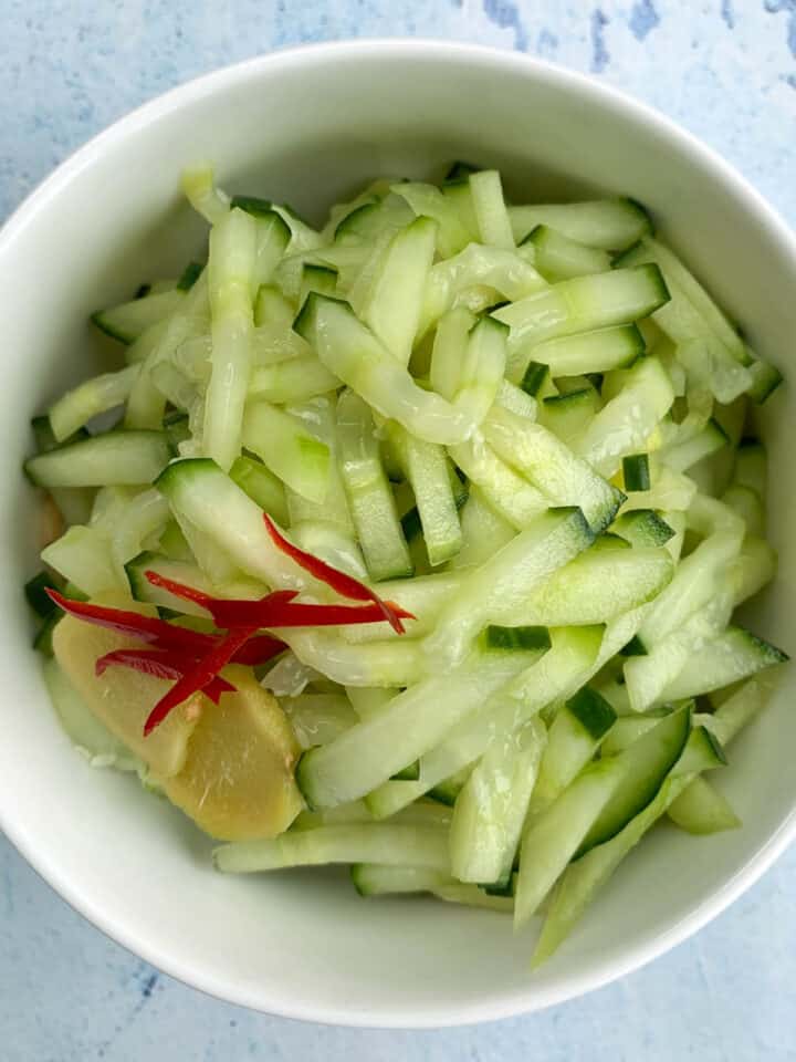 cucumber relish. Thinly sliced cucumbers served with ginger slices and chilli