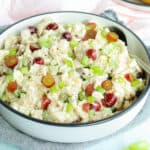 creamy chicken salad in a large white bowl.